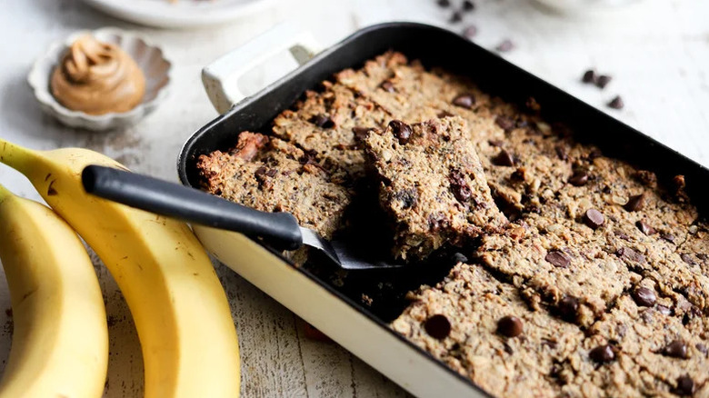 Peanut Butter and Roasted Banana Baked Oatmeal cut into squares