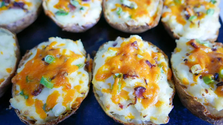 Ultimate Twice-Baked Potatoes on black surface