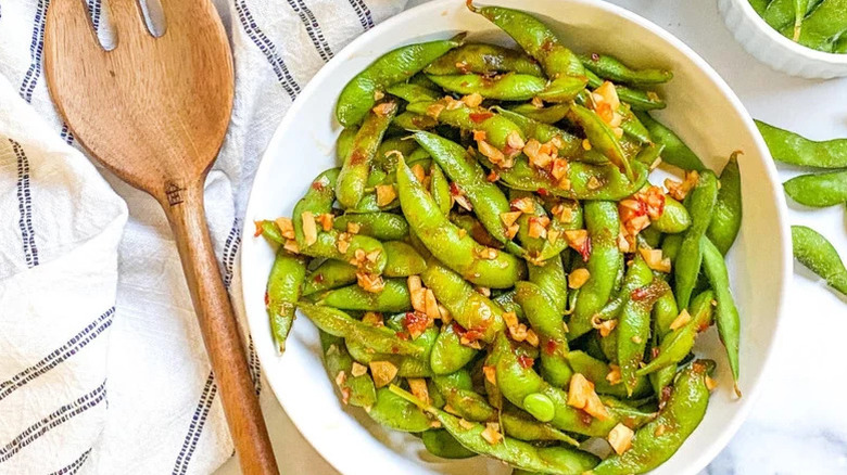 Spicy garlic edamame in bowl
