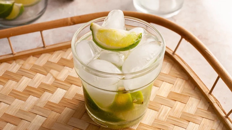 Classic Caipirinha Cocktail in glass with lots of ice
