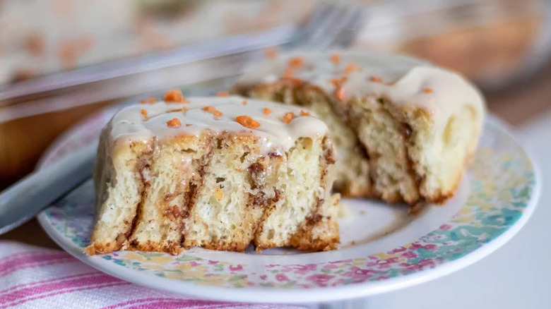 Carrot Cake Cinnamon Rolls on patterned plate