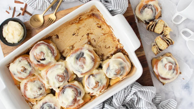 Fluffy Overnight Cinnamon Rolls in white baking dish