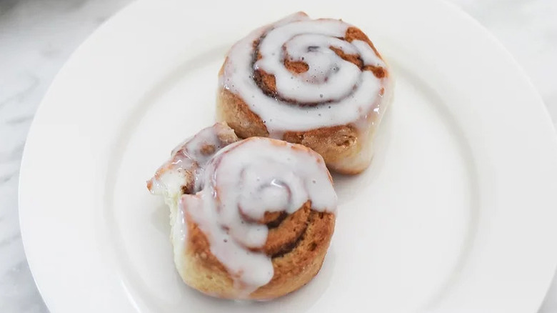 Two From-Scratch Cinnamon Rolls on white plate