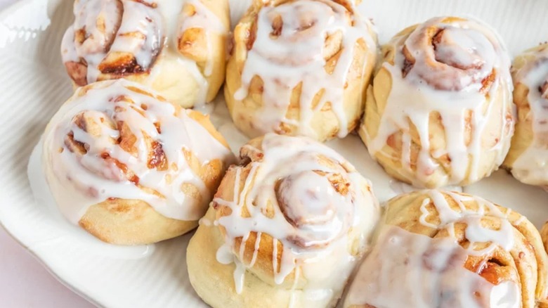 Raspberry Cinnamon Rolls in white baking pan