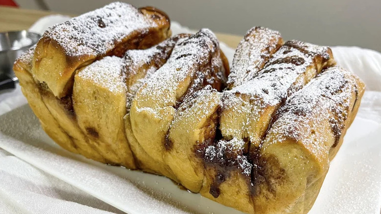Pull-Apart Gingerbread Cinnamon Rolls on white plate