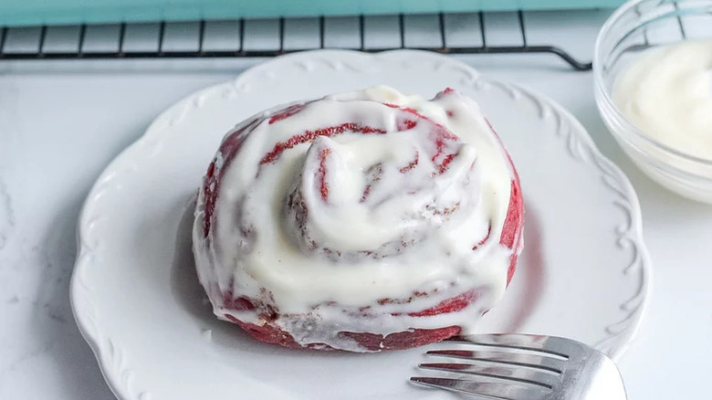 Red Velvet Cinnamon Rolls on white plate