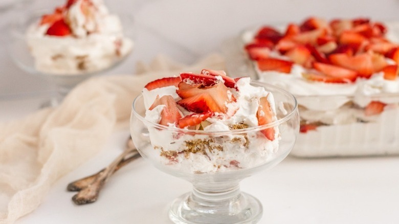 Strawberry icebox cake in a baking dish and serving glasses
