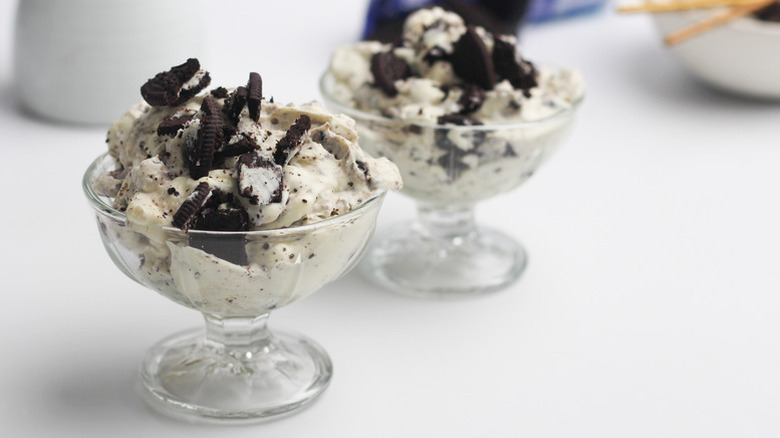 Creamy Oreo fluff dessert in two serving glasses