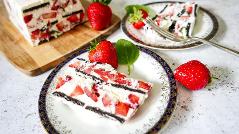 Chocolate Strawberry Icebox Cake on decorative plates with strawberries
