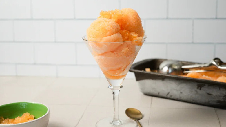 Easy 3-Ingredient Cantaloupe Sorbet in glass goblet on countertop