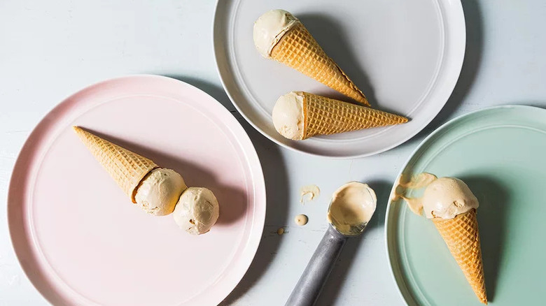 Vegan Salted Caramel Ice Cream with cones on pastel-colored plates