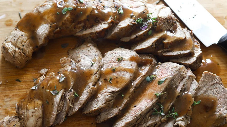 Instant Pot Pork Tenderloin on wooden cutting board