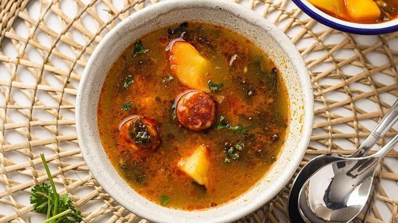 Bowl of kale, chorizo, and potato soup