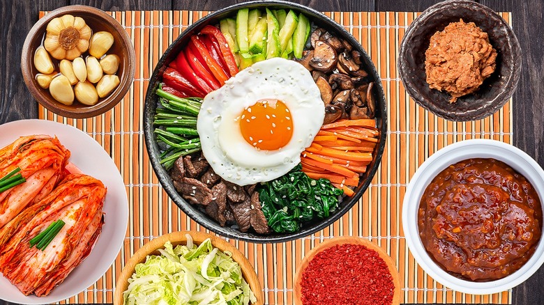 a variety of colorful korean dishes