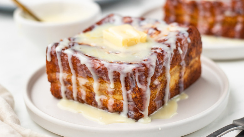 French toast topped with condensed milk and butter