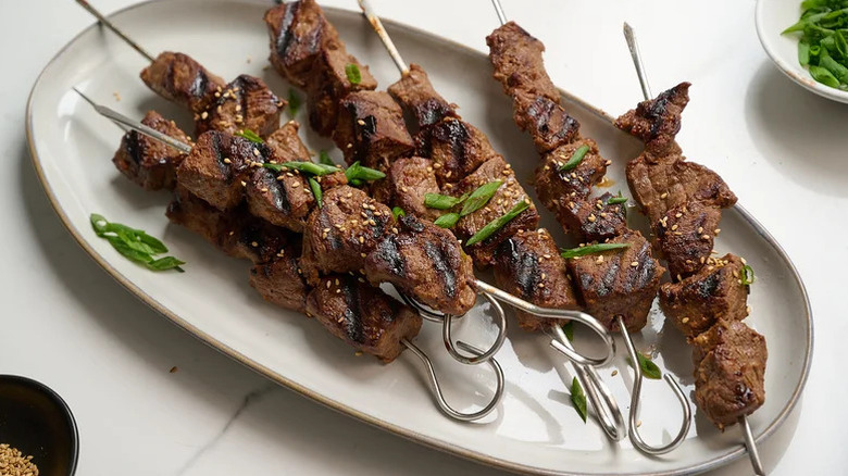 beef bulgogi kebabs on plate