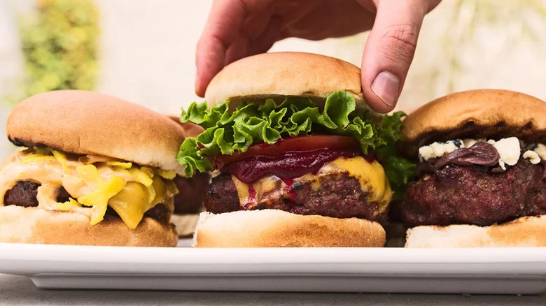 three beef burgers