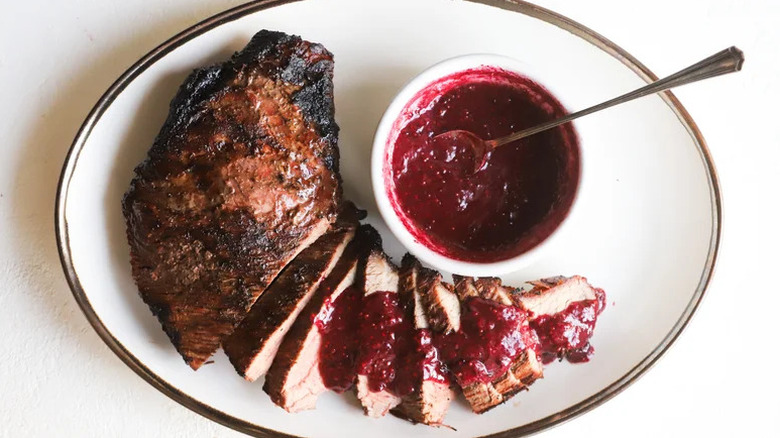 grilled tri tip with blackberry mustard in bowl