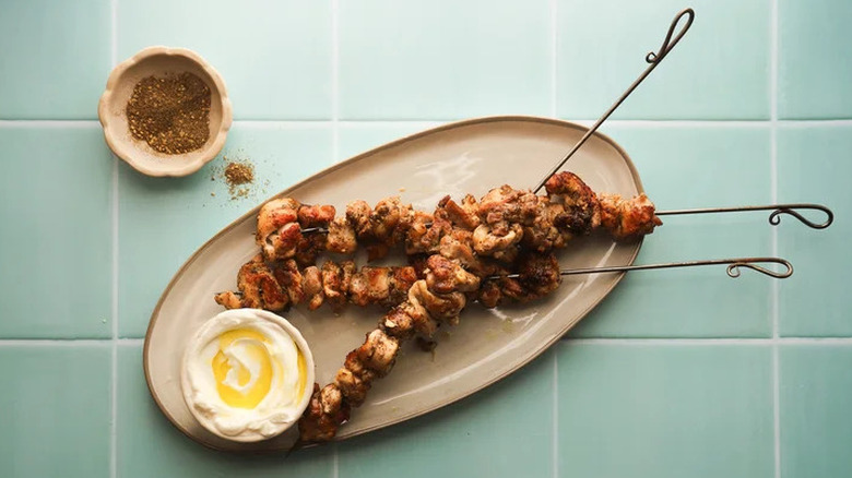 grilled za'atar chicken skewers on plate