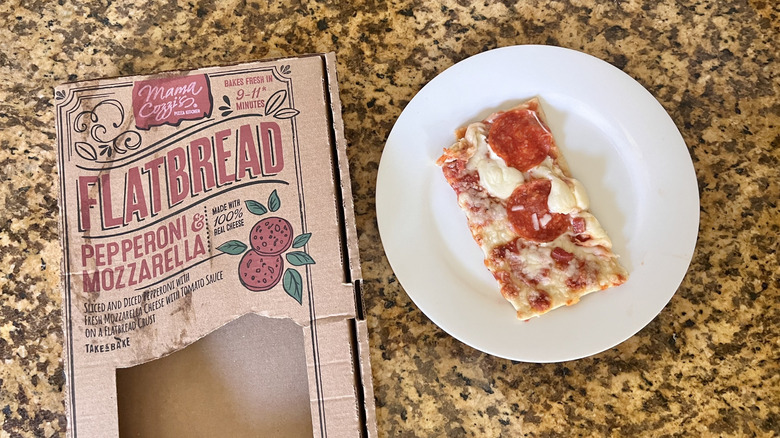 A piece of Mama Cozzi's Pepperoni Mozzarella Flatbread on a plate