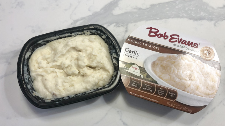 Bob Evans garlic mashed potatoes in a tub.