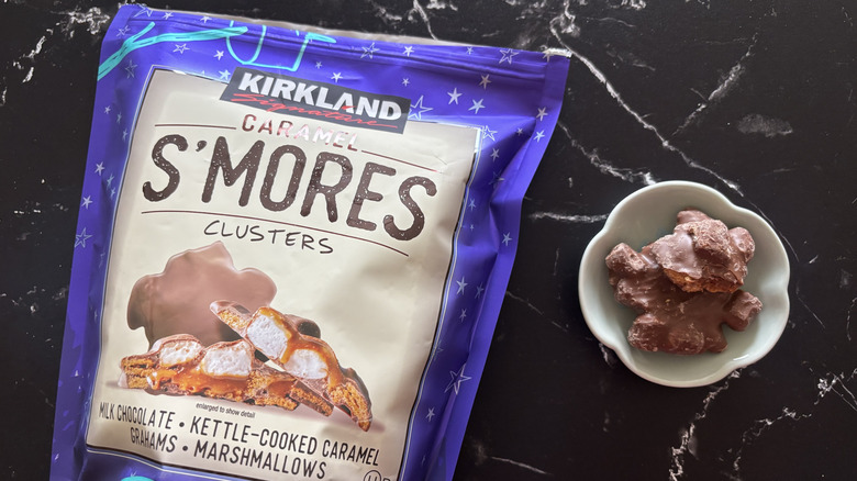 Kirkland Signature s'mores clusters bag next to s'mores clusters on plate