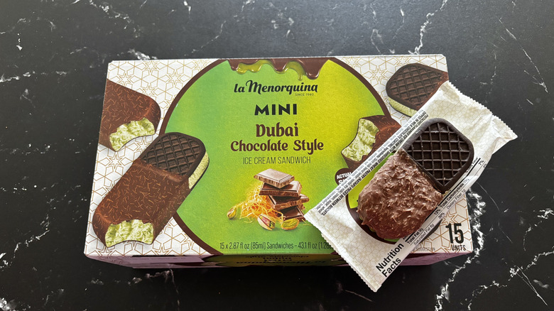 Costco Dubai chocolate ice cream sandwiches box with ice cream sandwich on top