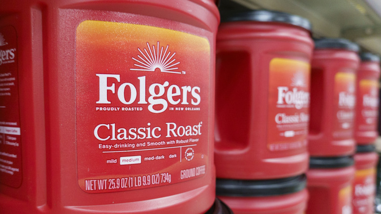 Folgers coffee canisters on shelf