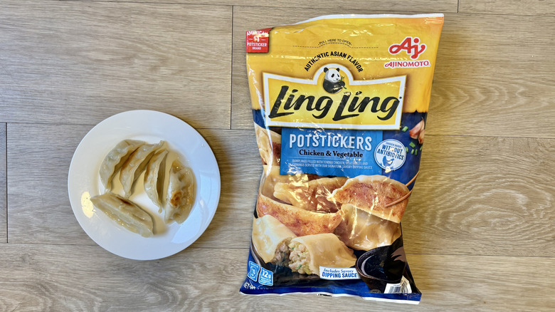 Five pieces of Ajinomoto Ling Ling Chicken and Vegetable Potstickers on a plate