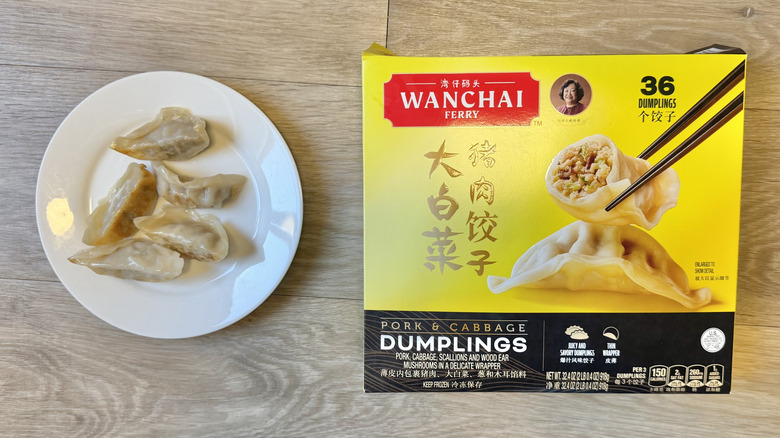 Five pieces of Wanchai Ferry Pork & Cabbage Dumplings on a plate