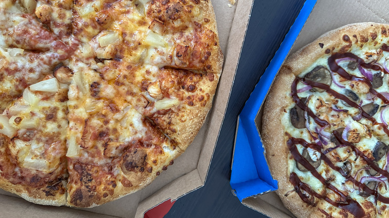 Two Domino's pizzas in their boxes