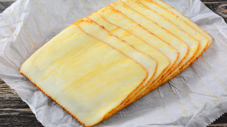 A stack of sliced muenster cheese