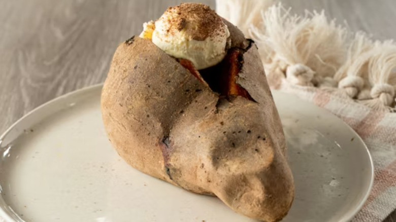 Logan's Roadhouse sweet potato side dish with butter and cinnamon.