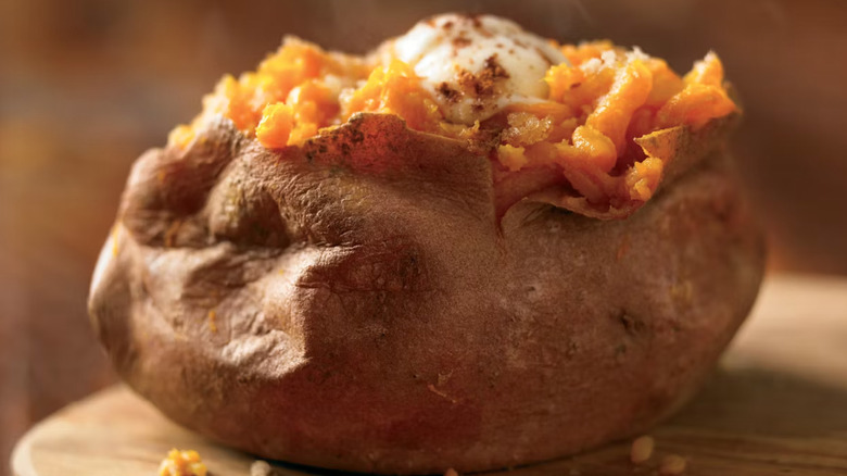 Outback Steakhouse baked sweet potato side dish with butter and cinnamon sugar.