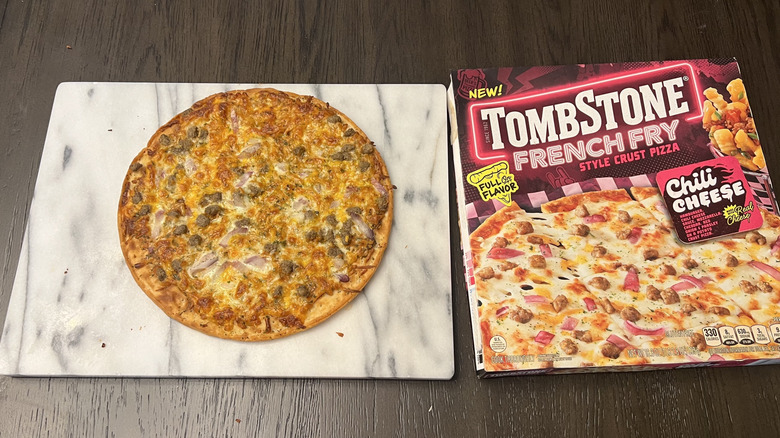 Tombstone Chili Cheese French Fry Crust Pizza on serving board.