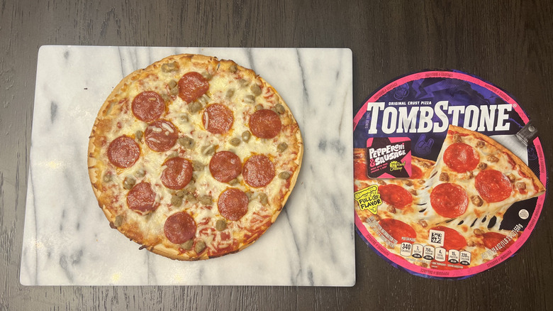Tombstone Pepperoni & Sausage Original Thin Crust on serving board.