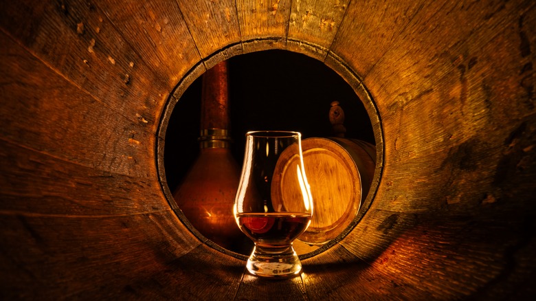 Irish whiskey, glass and barrel