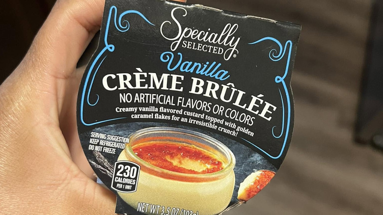 customer holding Crème Brûlée package
