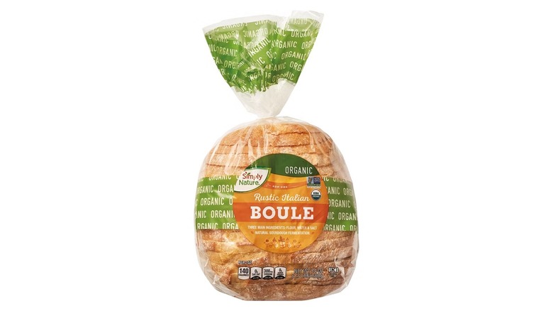 loaf of Simply Nature Organic Rustic Italian Boule in plastic bag on white background
