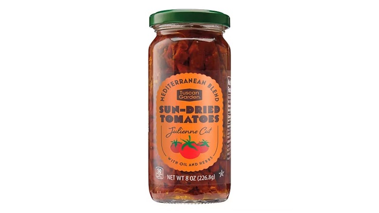 jar of Aldi Tuscan Garden Sun-dried Tomatoes on white background