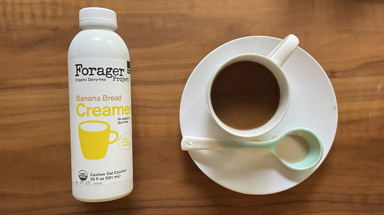 Forager banana creamer in a bottle and in a coffee cup
