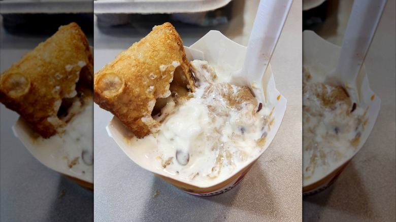 McDonald's apple pie mixed into vanilla McFlurry ice cream dessert in cup with spoon
