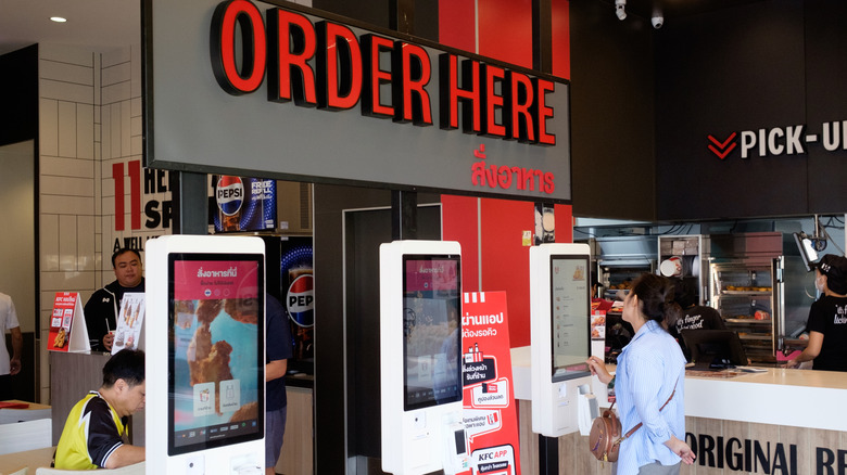 Inside order kiosk at KFC