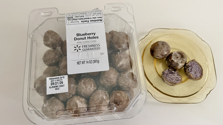 Freshness Guaranteed Blueberry Donut Holes in a plastic container