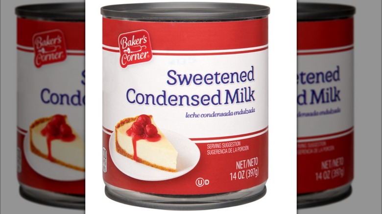 Can of sweetened condensed milk with image of cheesecake on front of label