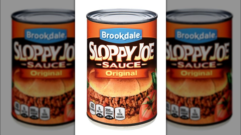 Can of sloppy Joe sauce with image of sandwich and tomato on front of label