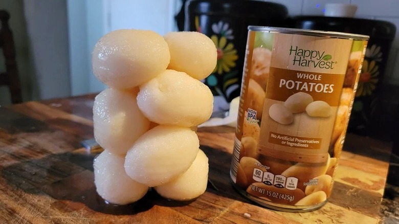 Canned potatoes removed from can, maintaining cylindrical shape
