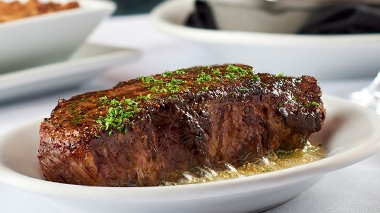 Ruth's Chris Steak House New York strip on white plate