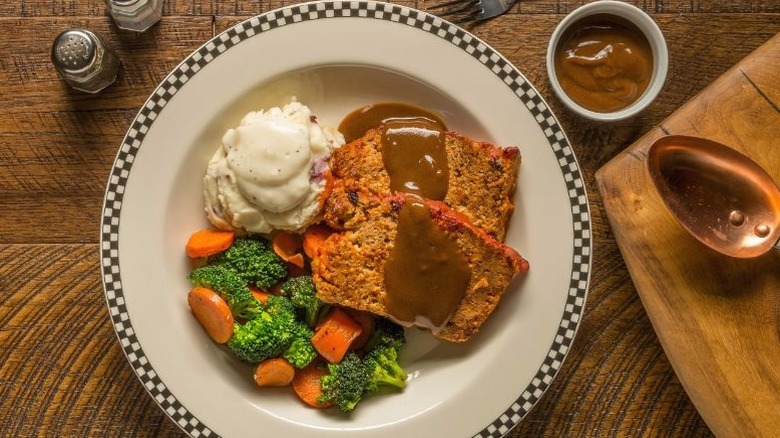 Black Bear Diner's meatloaf with brown gravy, mashed potatoes and cooked vegetables