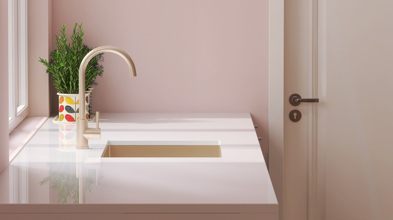 White laminate kitchen counter with sink